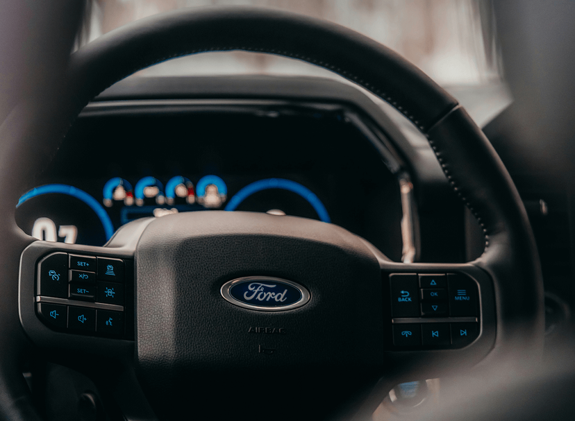 Lexus and GMC hybrid vehicle